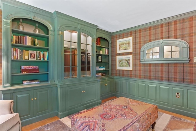 114 Chestnut St, North Reading, MA 01864 - sitting room with wallpapered walls, wood finished floors, a wainscoted wall, and crown molding