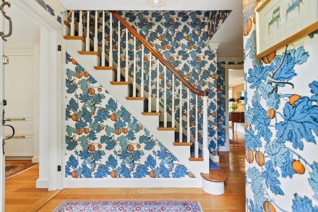 114 Chestnut St, North Reading, MA 01864 - staircase featuring wood finished floors and wallpapered walls