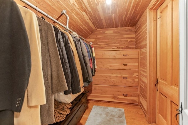 114 Chestnut St, North Reading, MA 01864 - walk in closet featuring light wood finished floors and vaulted ceiling