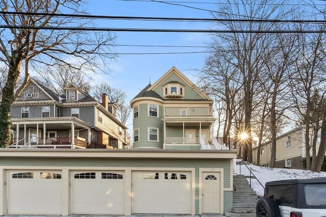 victorian home with a garage