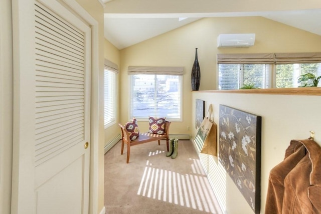 living area featuring light colored carpet, lofted ceiling, and a wall mounted AC