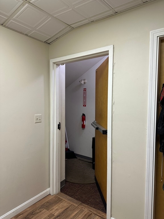 hallway featuring hardwood / wood-style flooring