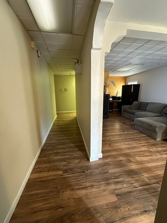 hallway featuring dark wood-type flooring