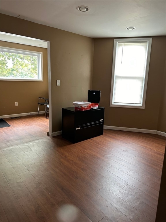 spare room with light wood-type flooring