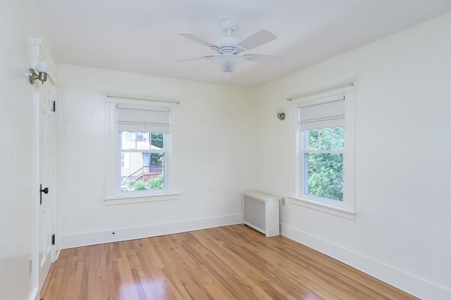20 Blaine Ave, Worcester, MA 01603 - empty room with light wood finished floors and a ceiling fan