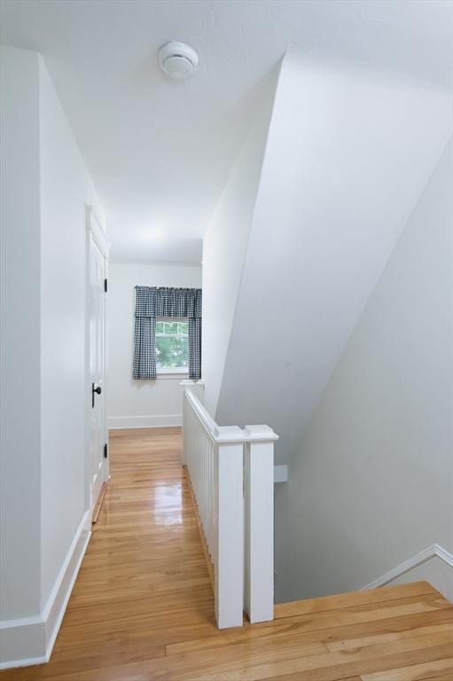 20 Blaine Ave, Worcester, MA 01603 - hallway with light wood-style flooring and an upstairs landing