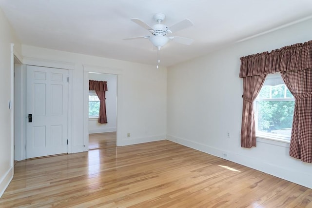 20 Blaine Ave, Worcester, MA 01603 - spare room with healthy amount of natural light, light wood finished floors, and a ceiling fan