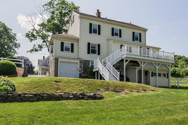 20 Blaine Ave, Worcester, MA 01603 - rear view of property with stairway, a yard, a garage, and a chimney