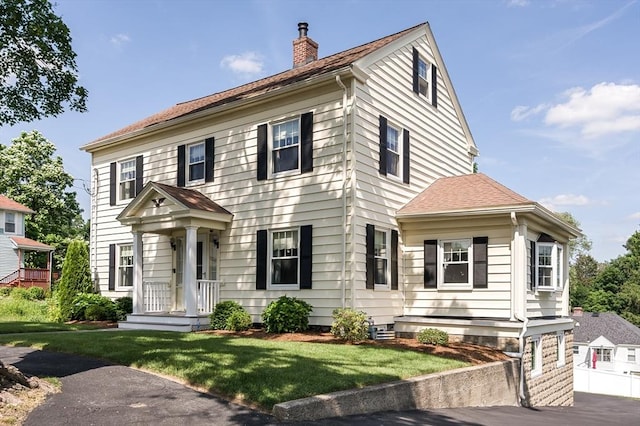 20 Blaine Ave, Worcester, MA 01603 - colonial house with a chimney and a front yard