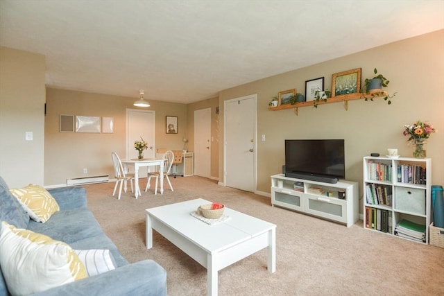145 Milk St Unit 10, Westborough, MA 01581 - living room with a baseboard radiator and light carpet