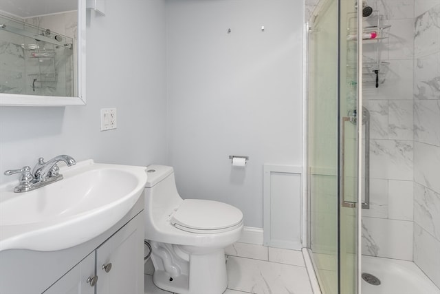 bathroom featuring an enclosed shower, vanity, and toilet