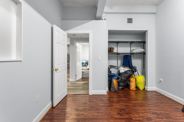 bedroom featuring dark hardwood / wood-style floors