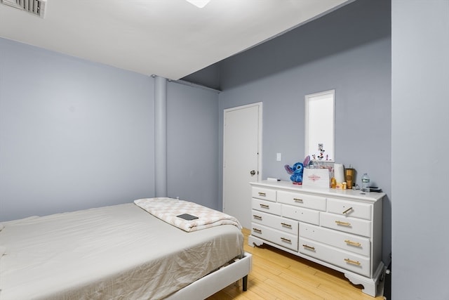 bedroom featuring light wood-type flooring