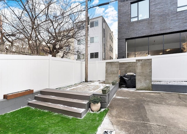 exterior space featuring a vegetable garden and a fenced backyard