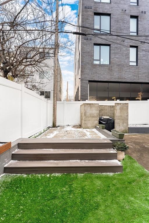 wooden deck featuring fence