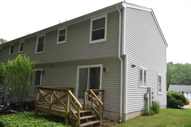 270 Sunderland St Unit 77, Worcester, MA 01604 - back of house with a deck and a lawn