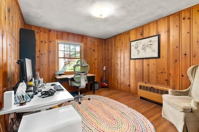 119 S Main St, Sharon, MA 02067 - office area featuring wood finished floors, radiator, and wooden walls