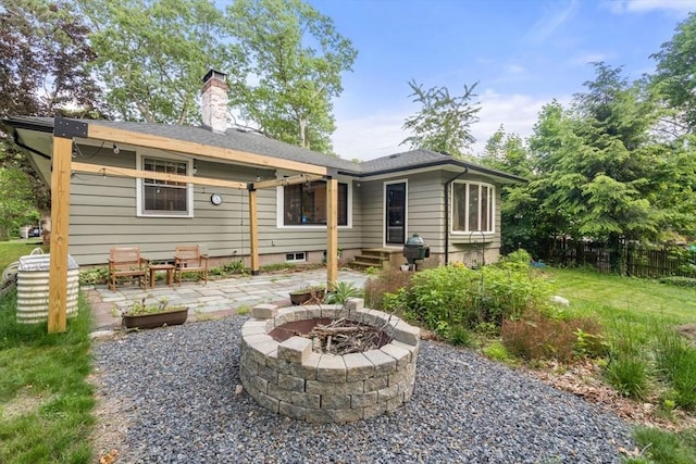 119 S Main St, Sharon, MA 02067 - rear view of property featuring a fire pit, a patio, and a chimney