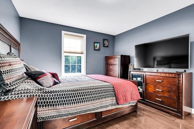 bedroom featuring hardwood / wood-style floors