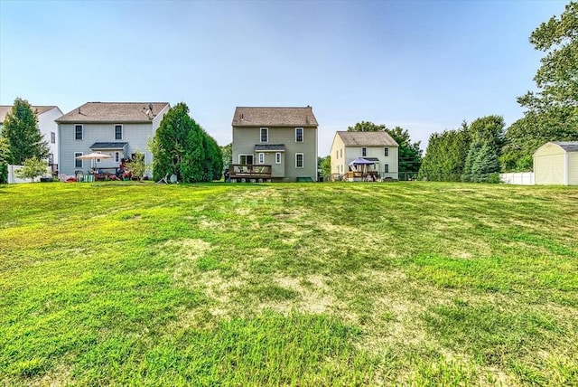 view of yard with a deck