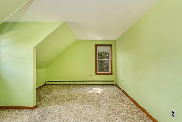 1049 Pleasant St, Canton, MA 02021 - bonus room with carpet flooring, baseboards, vaulted ceiling, and a baseboard radiator