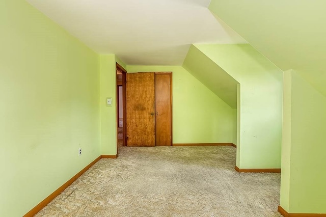 1049 Pleasant St, Canton, MA 02021 - bonus room featuring carpet floors, baseboards, and lofted ceiling