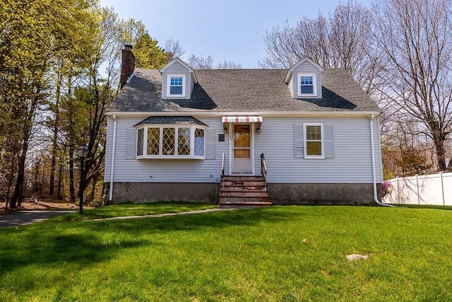 1049 Pleasant St, Canton, MA 02021 - cape cod house with entry steps, fence, a chimney, and a front lawn