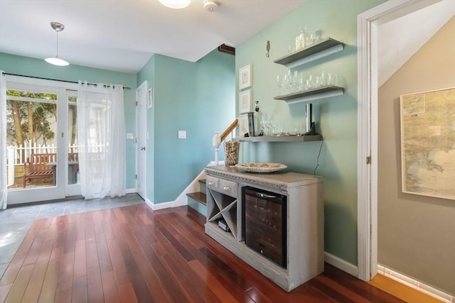 69 Leverett Ave, Revere, MA 02151 - indoor dry bar with wood finished floors, baseboards, and wine cooler