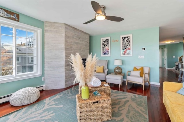 69 Leverett Ave, Revere, MA 02151 - sitting room featuring wood finished floors, a ceiling fan, and a baseboard radiator