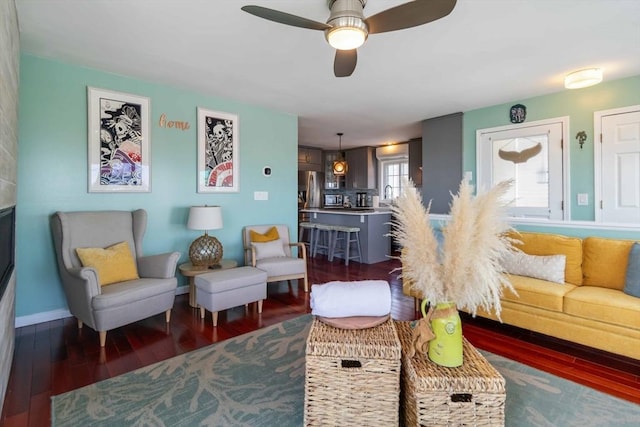 69 Leverett Ave, Revere, MA 02151 - living area featuring ceiling fan, dark wood finished floors, and baseboards