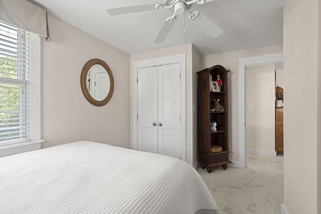 3 Roosevelt Pl, Newburyport, MA 01950 - bedroom with light carpet, a closet, a ceiling fan, and baseboards