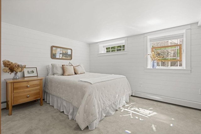 3 Roosevelt Pl, Newburyport, MA 01950 - carpeted bedroom with a baseboard radiator and wood walls