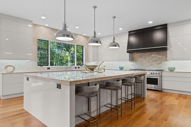 kitchen with modern cabinets and white cabinetry