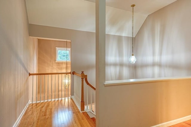 106 Willow Brook Dr Unit 106, Wayland, MA 01778 - stairs with hardwood / wood-style floors and vaulted ceiling