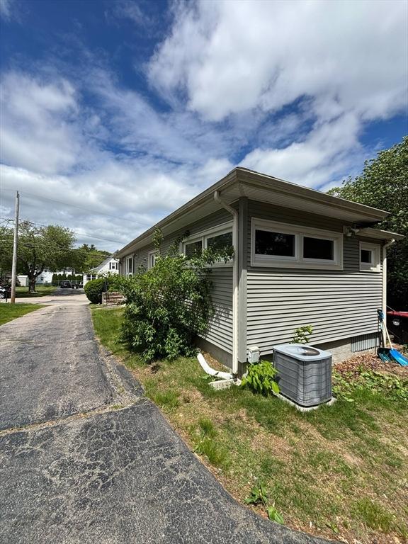 29 Bower Ave, Brockton, MA 02301 - view of side of home featuring cooling unit