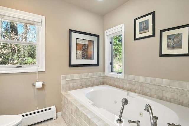 full bath with a jetted tub, tile patterned flooring, baseboards, a baseboard heating unit, and toilet