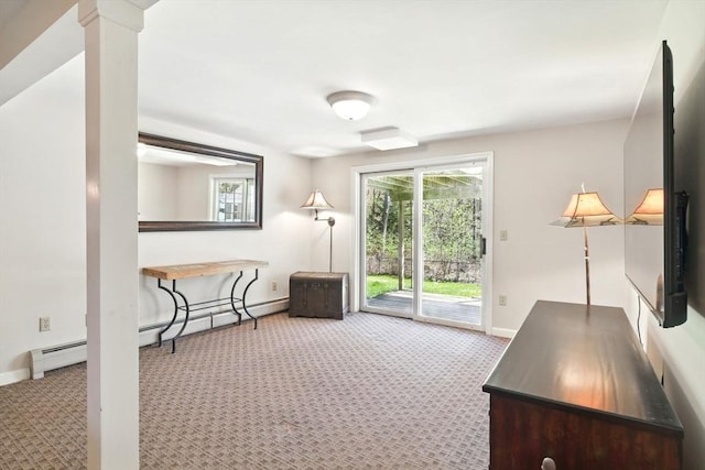 interior space with baseboards, a baseboard radiator, and carpet flooring