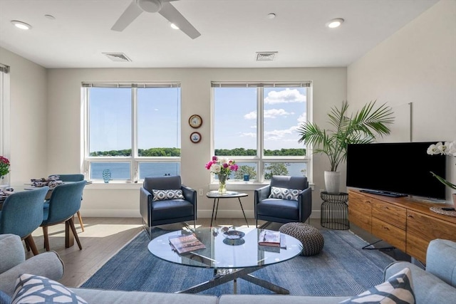 130 Broad Reach Unit 303, Weymouth, MA 02191 - living room featuring wood finished floors, a ceiling fan, baseboards, and recessed lighting