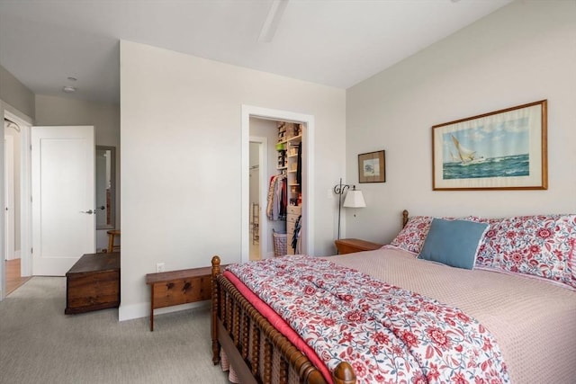 130 Broad Reach Unit 303, Weymouth, MA 02191 - bedroom with light carpet, a spacious closet, baseboards, and a closet