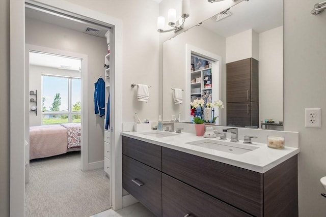 130 Broad Reach Unit 303, Weymouth, MA 02191 - ensuite bathroom with double vanity and baseboards
