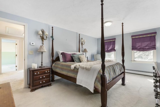 carpeted bedroom with a baseboard radiator