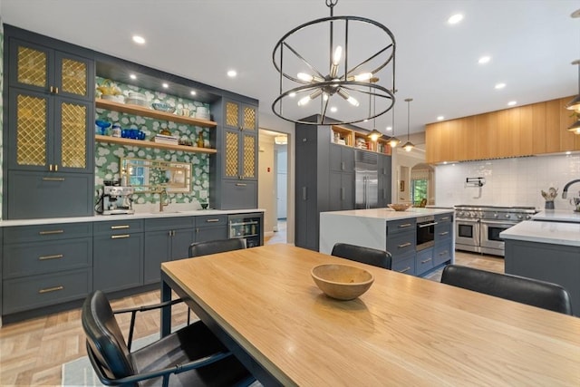 22 Flintlock Rd, Lexington, MA 02420 - dining room featuring a chandelier, beverage cooler, and recessed lighting