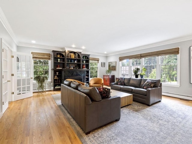 22 Flintlock Rd, Lexington, MA 02420 - living room featuring light wood-type flooring, crown molding, baseboard heating, healthy amount of natural light, and recessed lighting