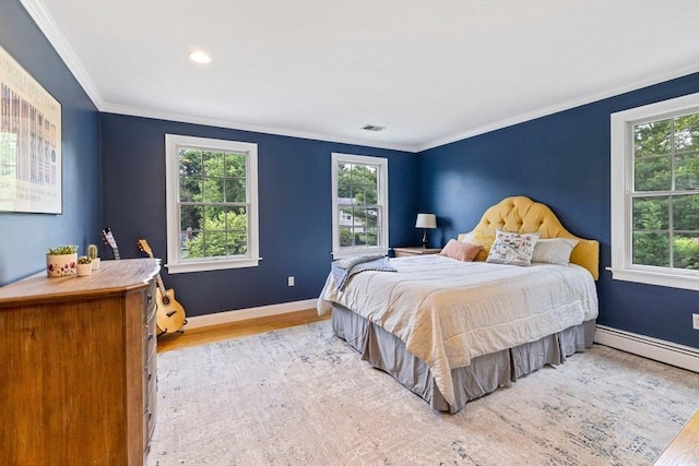 22 Flintlock Rd, Lexington, MA 02420 - bedroom featuring light wood-type flooring, ornamental molding, and a baseboard radiator
