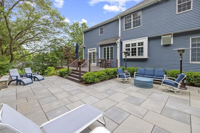 22 Flintlock Rd, Lexington, MA 02420 - view of patio featuring a wooden deck and outdoor lounge area
