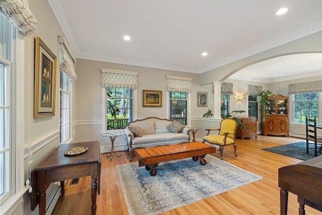 22 Flintlock Rd, Lexington, MA 02420 - living area with arched walkways, a baseboard radiator, wood finished floors, recessed lighting, and crown molding