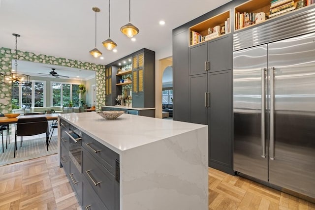 22 Flintlock Rd, Lexington, MA 02420 - kitchen featuring built in refrigerator, open shelves, a ceiling fan, hanging light fixtures, and recessed lighting