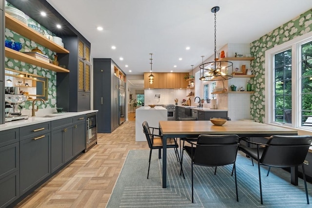 22 Flintlock Rd, Lexington, MA 02420 - dining room featuring wine cooler, recessed lighting, and a chandelier