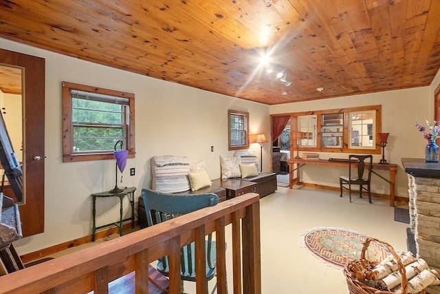 bedroom with wooden ceiling and baseboards