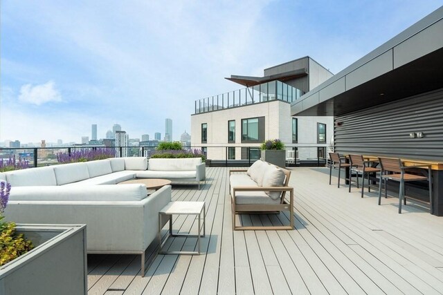 deck featuring outdoor lounge area